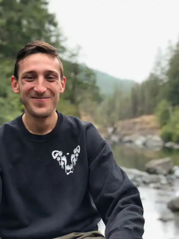 dandi lion dandelion the honest whisper black sweater lion non-profit vegan online shop animal rights british columbia canada casual forest wilderness explore river stream